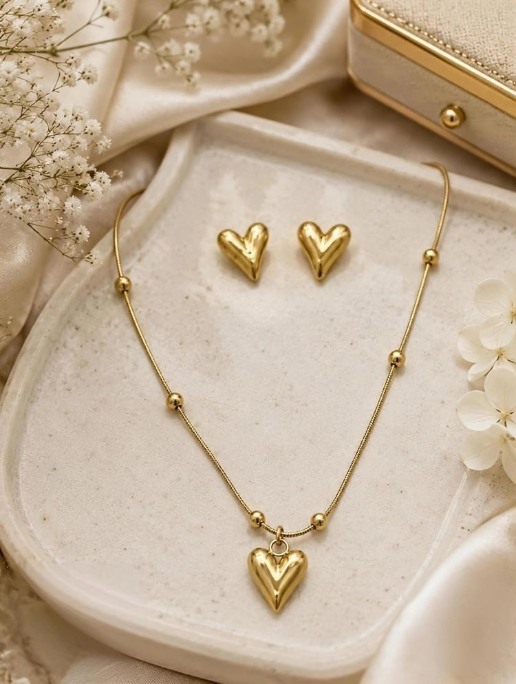 طقم سلسلة وحلق قلوب دهبي ستانلس بيور عيار 316
